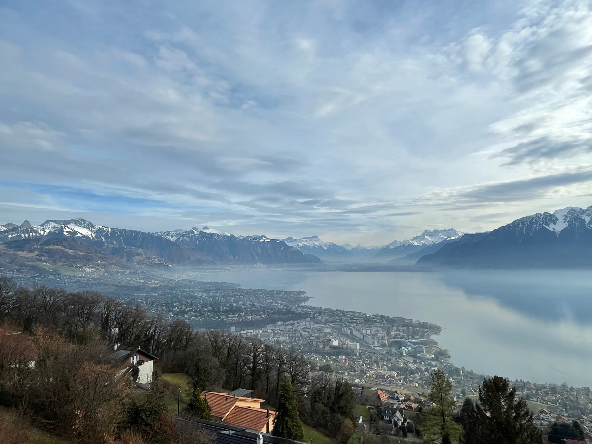 View over Lake Geneva and the Alps from Le Mirador in Mont-Pèlerin on a winter day
