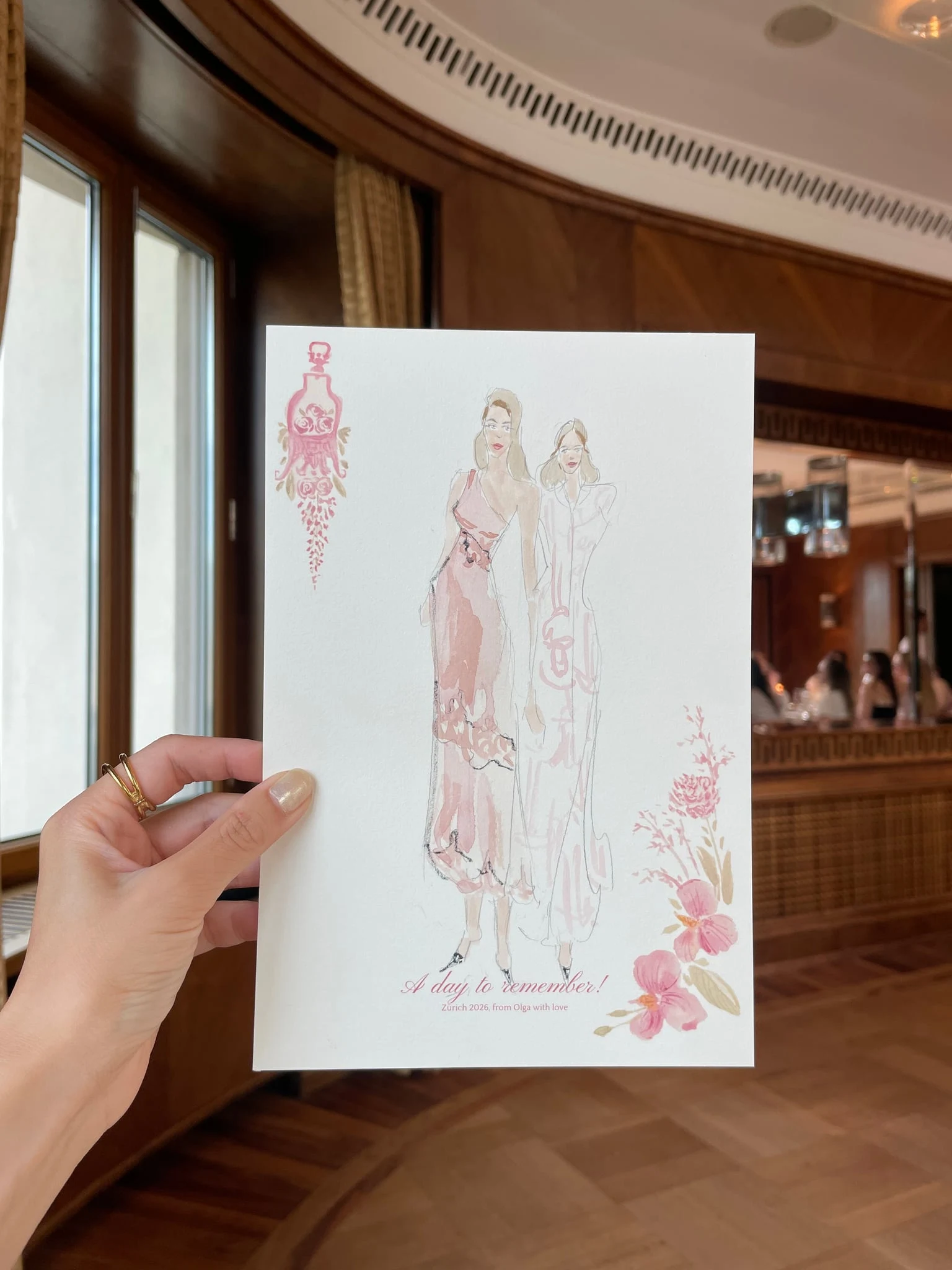 Live watercolor illustration of two guests in pink and white at a birthday party at AMERON Zürich Bellerive au Lac.
