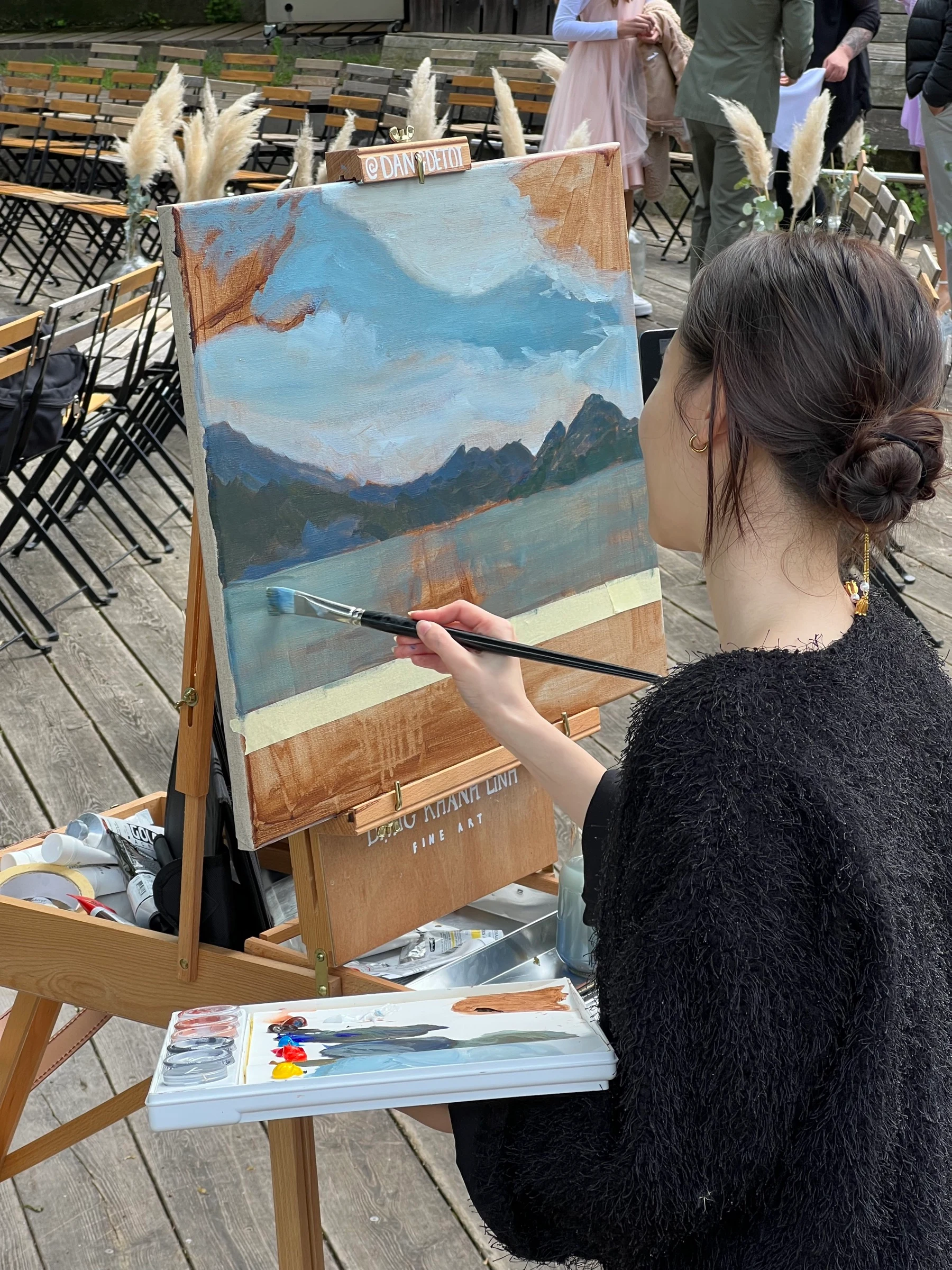 Artist palette and brushes for live wedding painting in Switzerland.